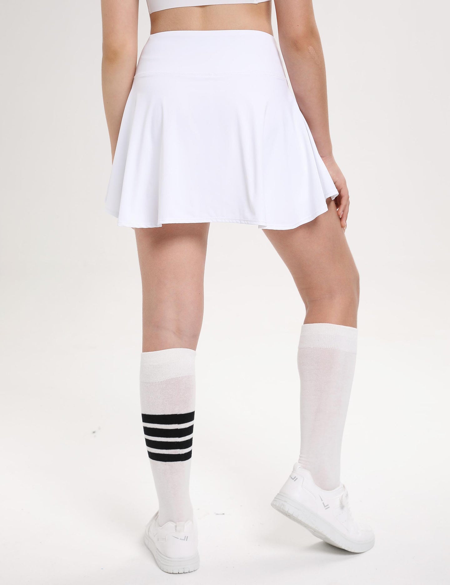 Falda deportiva para niñas con forro de malla